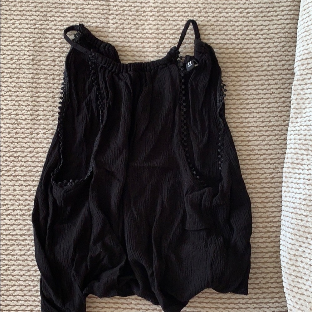 Black tank top small or medium . Never worn